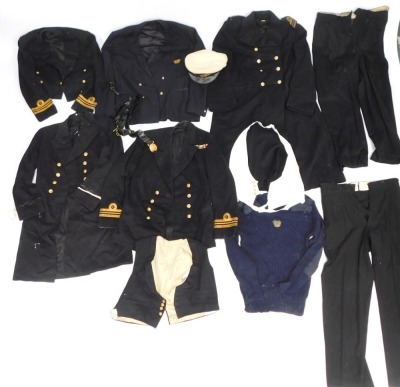 A group of Naval Officer's uniforms, over coats and belts. (1 box)