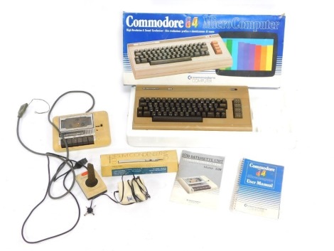 A Commodore 64 computer, controllers and accessories, boxed. (a quantity) WARNING! This lot contains untested or unsafe electrical items. It is supplied for scrap or re-conditioning only. TRADE ONLY