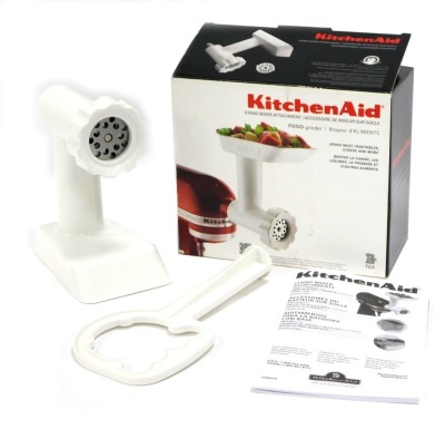 A Kitchen Aid stand mixer attachment, food grinder, boxed.