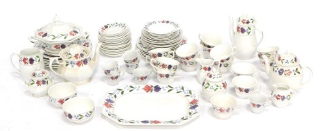 An Adams Old Colonial pattern part tea and dinner service, comprising cups and saucers, tureens, dinner plates, serving plate, milk jug, sugar bowl, coffee pot, etc. (3 trays)