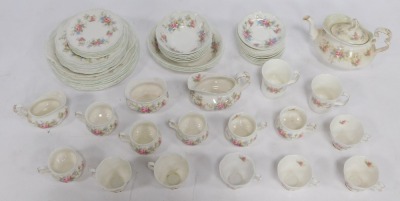 A Royal Albert part tea and dinner service in the Colleen pattern, comprising teapot, two beakers, two milk jugs, sugar bowl, two sets of six cups, twelve saucers, six bowls, three serving bowls, six side plates, six dinner plates, six large plates and a - 2