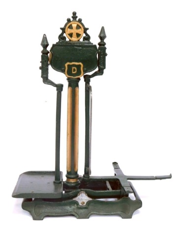 A set of green grocer's scales, over painted in green, with D emblem crest, 76cm high, 62cm wide.
