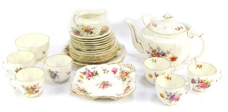 A Royal Crown Derby part tea service decorated in the Derby Posies pattern, comprising teapot, milk jug, sugar bowl, six cups and saucers, six side plates and two serving plates.