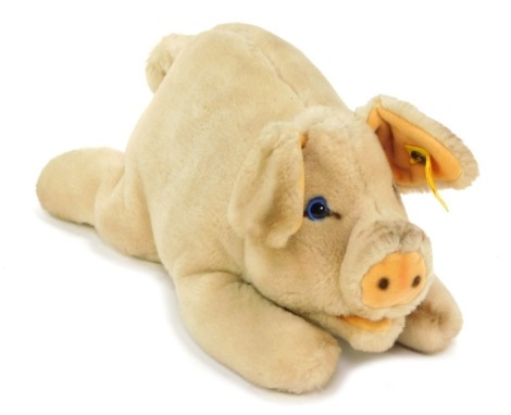 A Steiff pig, with yellow crest label, No 5415, 28cm wide.