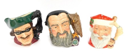 Three Royal Doulton large character jugs, comprising Merlin D6529, Dick Turpin D6528, and Santa Claus D6668. (3)