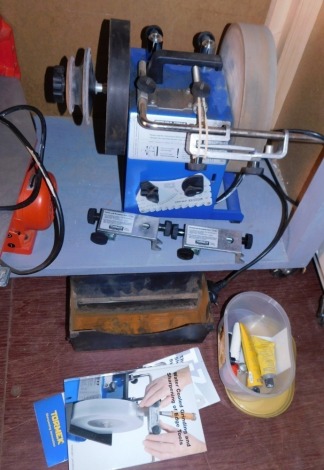 A Tormek T-7 water cooled sharpening system, with a small group of accessories.