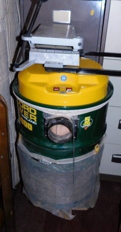 A Record Power dust extractor, model PX5000, with instruction book, 132cm high.