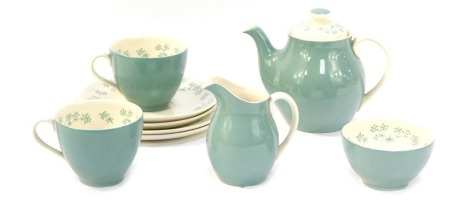 A Royal Doulton part tea service in the April Showers pattern, comprising teapot, two tea cups, two saucers, two side plates, milk jug and sugar bowl.