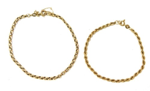 Two 9ct gold bracelets, to include a rope twist bracelet, 16cm long, and a curb link bracelet with safety chain, 18cm long, 5.6g. (2)