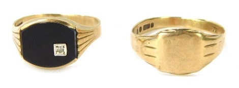 Two gentleman's signet rings, comprising a 9ct gold signet ring with black bloodstone set with tiny diamond, size U½, and a plain signet ring, stamped 375, size Y½, 6.6g all in. (2)