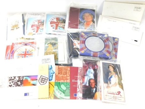 A group of coin presentation packs, to include 70th Birthday commemorative crown, Golden Wedding 1997 commemorative crown, 1999/2000 crowns, Prince of Wales 50th Birthday coin, 1998 UK coin pack (x2), 1999 UK coin pack (x2), 1997 UK coin pack (x2), 1996 U