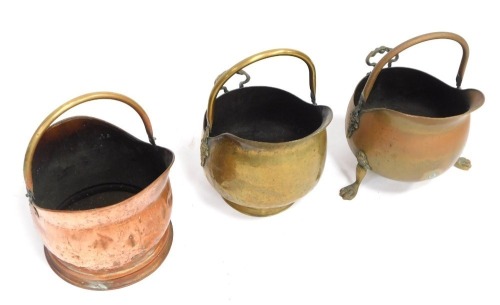 Three brass and copper coal helmets. (3)