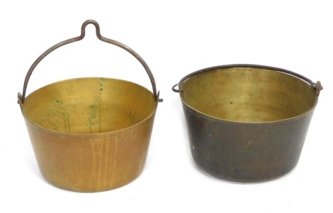 Two Victorian brass swing handle preserve pans, 29cm diameter. (2)