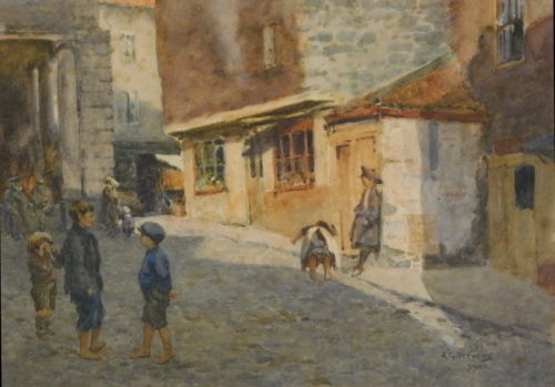 Albert George Stevens (1863-1925). Street scene, children on a path before houses and shops, watercolour, signed and dated 1906, 25cm x 34cm.