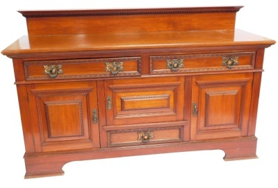 A Victorian walnut sideboard, with a carved galleried back, above two drawers and an arrangement of four cupboard doors, with carved borders, on bracket feet, 122cm high, 182cm wide, 63cm deep.