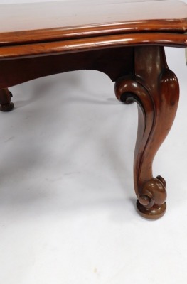 A Victorian mahogany extending dining table, with fluted and moulded two layered corners, on cabriole legs, terminating in castors, with four additional leaves, 75cm high, 132cm wide, 148cm deep, with additional leaves 60cm, 46cm, and two 27cm. - 5