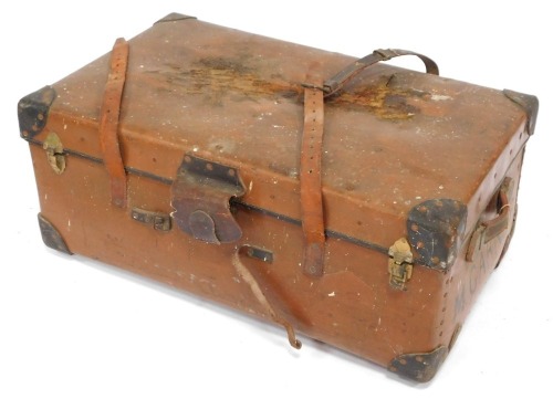 A canvas bound brown trunk, inscribed M Garner, 36cm high, 45cm wide, 52cm deep.