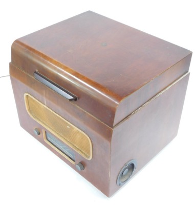 A Pye vintage radio, in walnut case. WARNING! This lot contains untested or unsafe electrical items. It is supplied for scrap or re-conditioning only. TRADE ONLY - 4