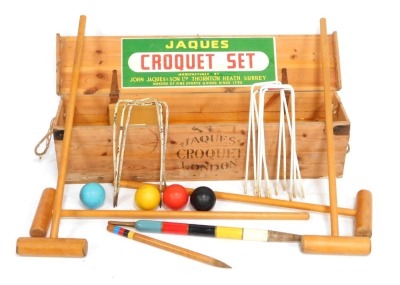 A Jaques croquet set, in a metal bound case.