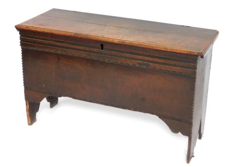 A late 17thC oak coffer, of plain form, on fishtail end supports, 62cm high, 97cm wide, 34cm deep.