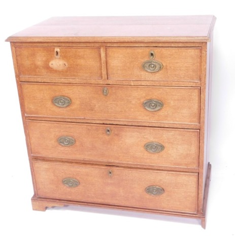 A 19thC oak chest of two short and three long drawers, with two panelled top, with brass handles and escutcheons, on bracket feet, 95cm high, 92cm wide, 52cm deep.