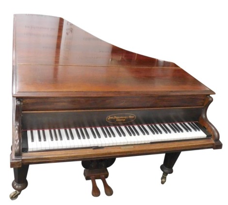 A late 19thC John Broadwood & Sons of London Grand piano, in rosewood case, serial number 1924, bearing label in pencil but rubbed, 93cm high, 135cm wide, 210cm deep.