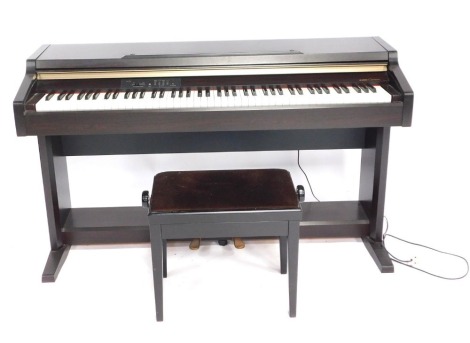 A Yamaha Clavinova CLP-920 keyboard, with music shelf, information booklet and stool, 83cm high, 135cm wide, 51cm deep.