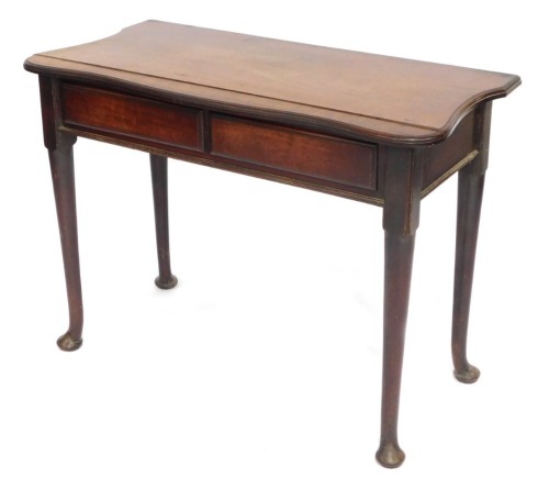 An 18thC mahogany side table, the shaped top above two drawers on pad feet, adapted, 70cm high, 94cm wide, 45cm deep.