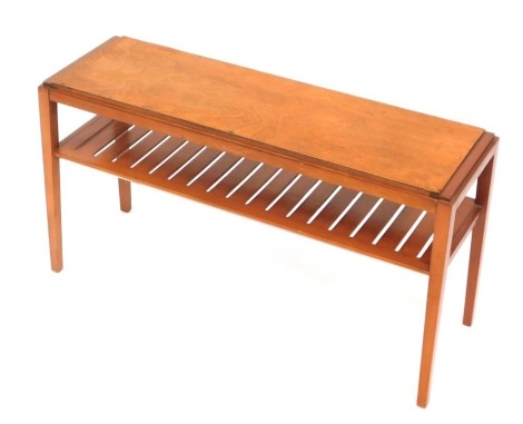 A stained beech and plywood side table, with rectangular top and slatted lower shelf, on tapered legs, 40cm high, 72cm wide, 23cm deep.