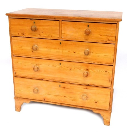 A Victorian pine chest, of two short and three long drawers, on bracket feet, 105cm high, 105cm wide, 52cm deep.