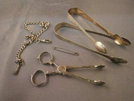 Two pairs of early 19thC silver sugar tongs