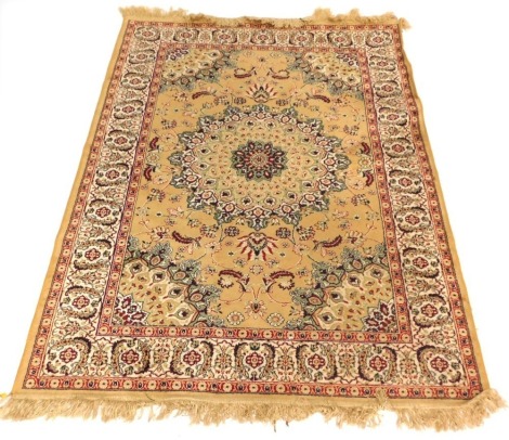 An Indian silk type rug, on cream ground with heavy floral design, 166cm x 113cm.