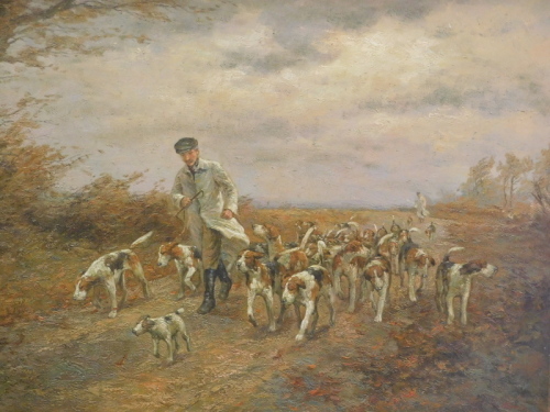Harris (20thC). Fox hounds with huntsmen on foot in a windy autumnal landscape, oil on canvas, signed, 71cm x 104cm.