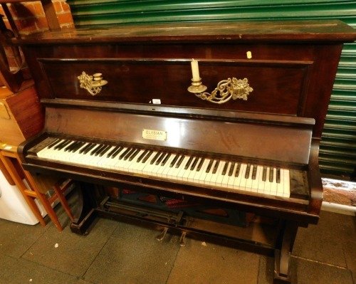 An Elysian Chappell Piano Company upright piano, in mahogany case with brass sconces, 131cm high, 142cm wide, 62cm deep.