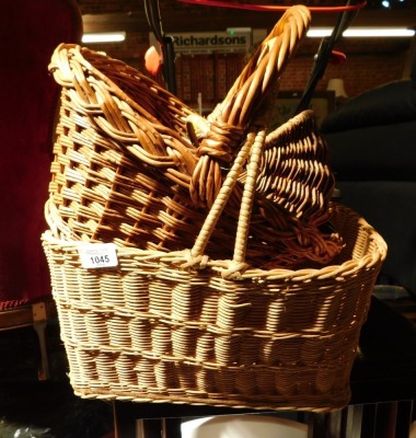 Three various wicker baskets.