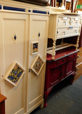 A white painted double wardrobe, inset with Italian style tiles, and a matching dressing table. (2)