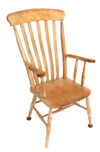 A stained beech lath back grandfather chair, with shaped arms, 122cm high, 62cm wide.