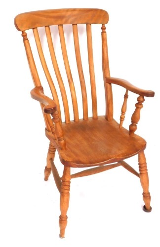 An ash and elm lath back grandfather chair, with shaped arms, 113cm high, 58cm wide.