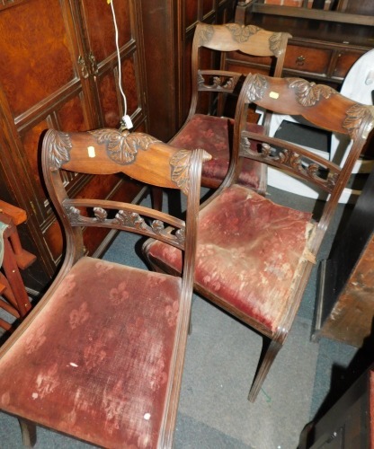 Three Regency mahogany dining chairs.