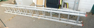 A two tier extending aluminium step ladder, approximately 3.5metres, 6.3metres when fully extended.