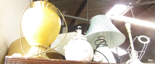 Various table lamps, comprising a duck egg blue side lamp, two taper candlestick lamps, shades, etc. (a quantity) WARNING! This lot contains untested or unsafe electrical items. It is supplied for scrap or re-conditioning only. TRADE ONLY