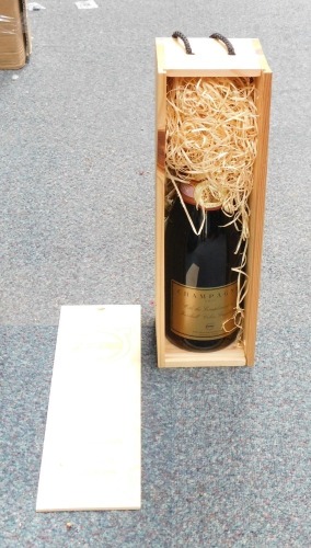 A presentation bottle of Champagne in wooden case.