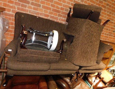 A high back two seater sofa, two matching armchairs, footstool and a chrome and leatherette finish bar stool. (5)The upholstery in this lot does not comply with the 1988 (Fire & Fire Furnishing) Regulations, unless sold to a known exporter or upholsterer