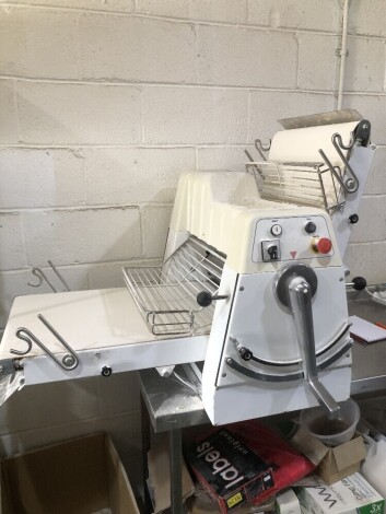 SOLD. A Kempex table top pastry brake. NB. VAT is payable on this lot at 20%. To be sold upon instructions from Vine's Bakery Ltd (in proposed liquidation)Viewing and collection is by appointment from their bakery premises at 13, Lincoln Central Industria