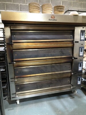 SOLD. A Ramalhos 12 tray modular four deck bread oven, 18" x30" tray, on trolley base and c/w a further solid standing base. NB. VAT is payable on this lot at 20%. To be sold upon instructions from Vine's Bakery Ltd (in proposed liquidation)Viewing and Co
