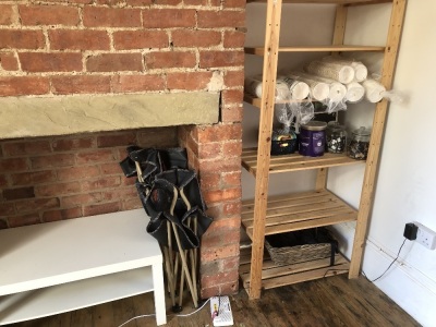 SOLD. The residual contents of the shop and store room, being two wooden counters, four shelved racks, stock of bags, cake stands & covers, etc. NB. VAT is payable on this lot at 20%. To be sold upon instructions from Vine's Bakery Ltd (in proposed liquid - 3