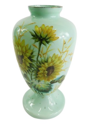 A Victorian mourning glass vase, handpainted with flowers, with dead leaf gentleman portrait to the side, on circular foot, 9cm high.