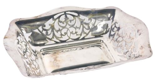 A George V silver dish, by Viners, with serpentine, part pierced body, decorated with shields and scrolls, Sheffield 1931, 28cm wide, 11.5oz.