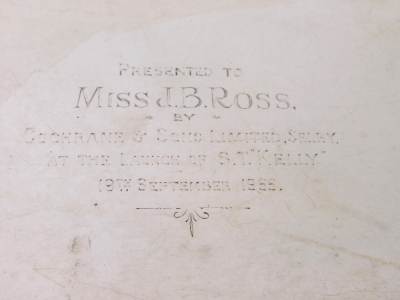 An Elizabeth II silver salver, by Viners, with piecrust border on scroll and orb feet, marked Presented to Miss JB Ross by Cochrane and Sons Limited Selby, at the Launch of ST Kelly 19th September 1955, Sheffield 1954, 27cm wide, 20oz, with two associated - 2