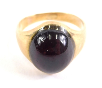 A 9ct gold dress ring, inset with red stone, size G, 5.3g all in. - 2